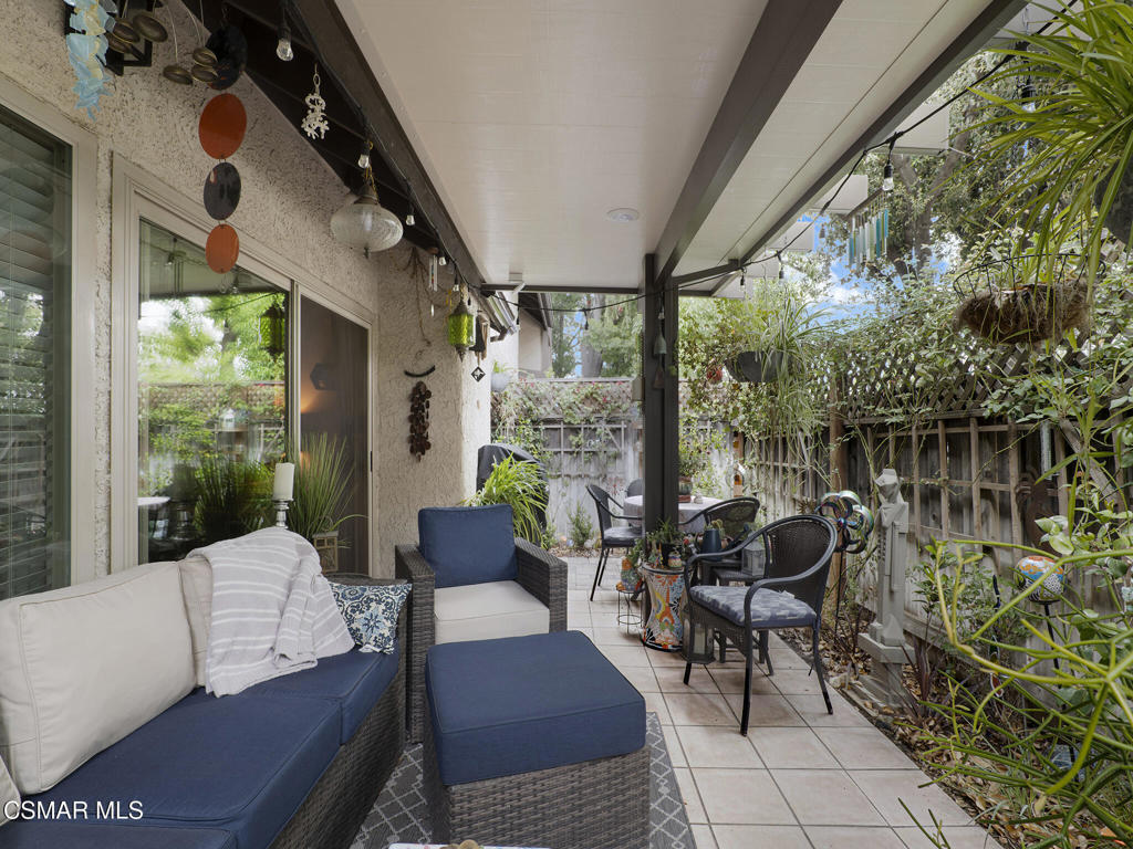 24829 Apple Street, Unit E Newhall, CA 91321 - Photo 25 of 29 a outdoor living space with furniture and garden view