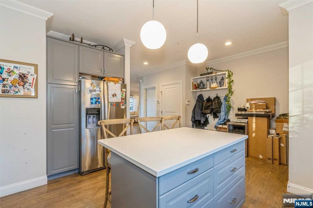 5 Benjamin Road Tenafly, NJ 07670 - Photo 18 of 50 a kitchen with a refrigerator and countertop