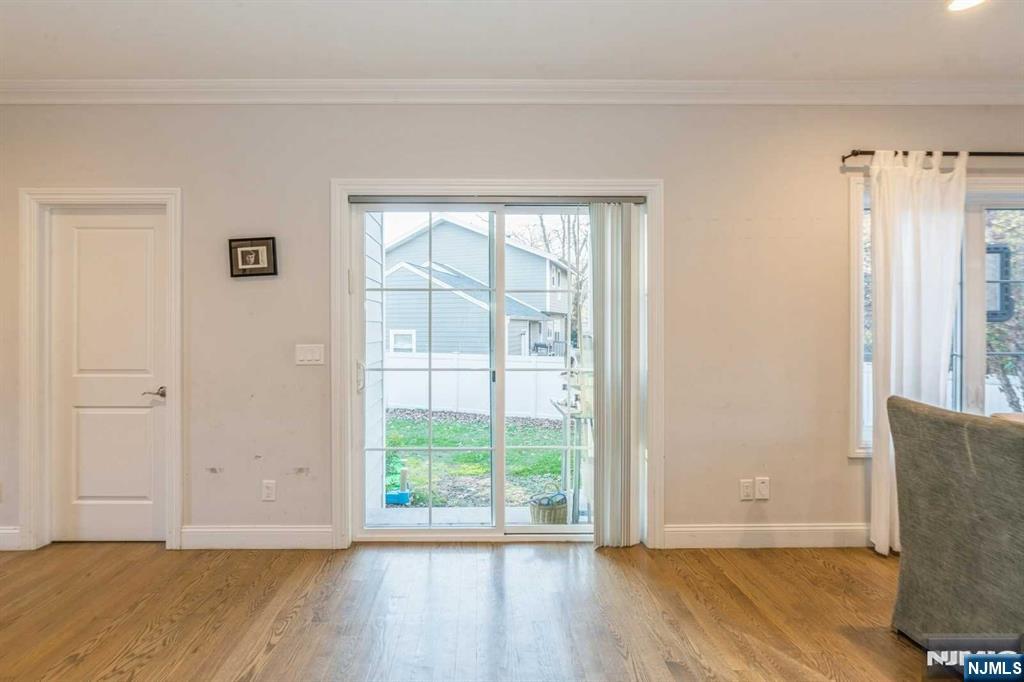 5 Benjamin Road Tenafly, NJ 07670 - Photo 2 of 50 a view of a livingroom with wooden floor and a window