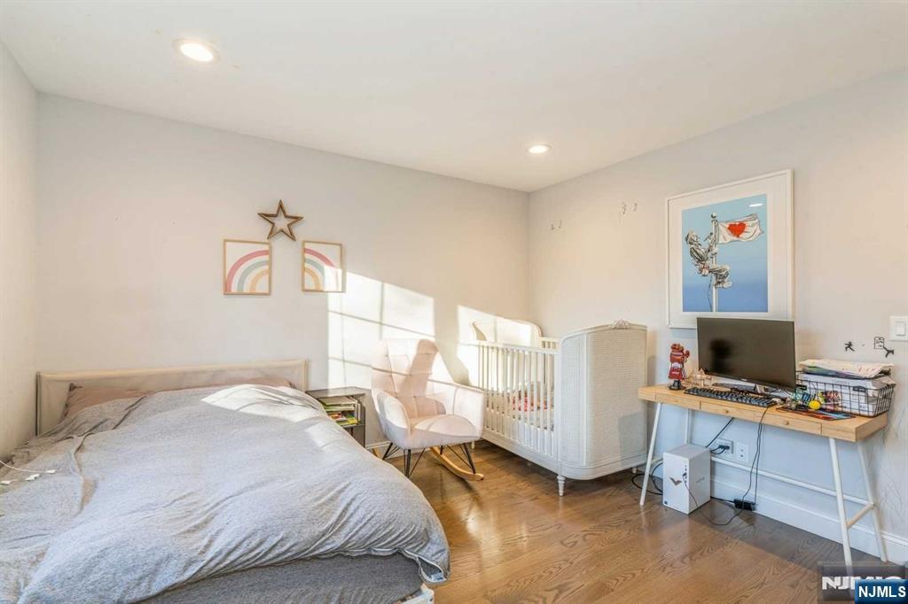 5 Benjamin Road Tenafly, NJ 07670 - Photo 25 of 50 a bedroom with a bed and a window