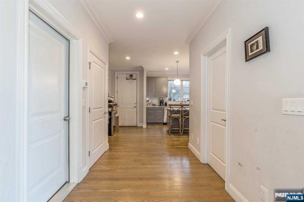 5 Benjamin Road Tenafly, NJ 07670 - Photo 33 of 50 a view of a hallway with wooden floor