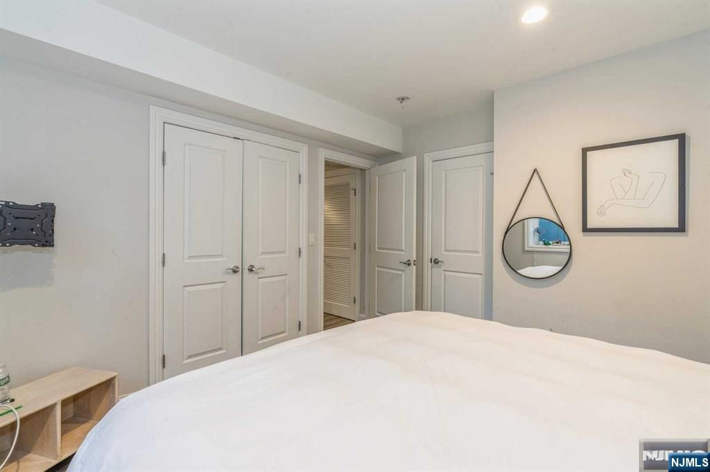 5 Benjamin Road Tenafly, NJ 07670 - Photo 35 of 50 a bedroom with a bed and a closet