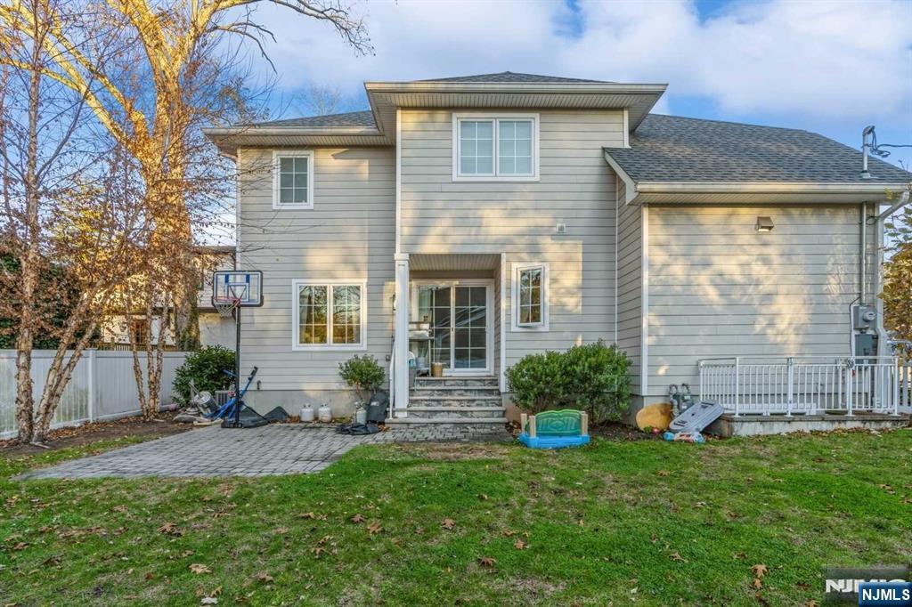 5 Benjamin Road Tenafly, NJ 07670 - Photo 39 of 50 a front view of a house with garden