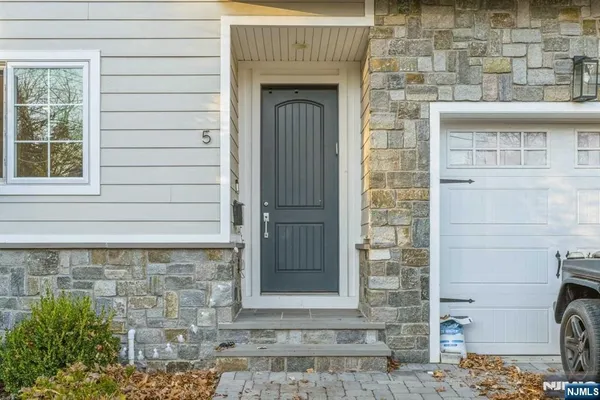 a front view of a house with a door