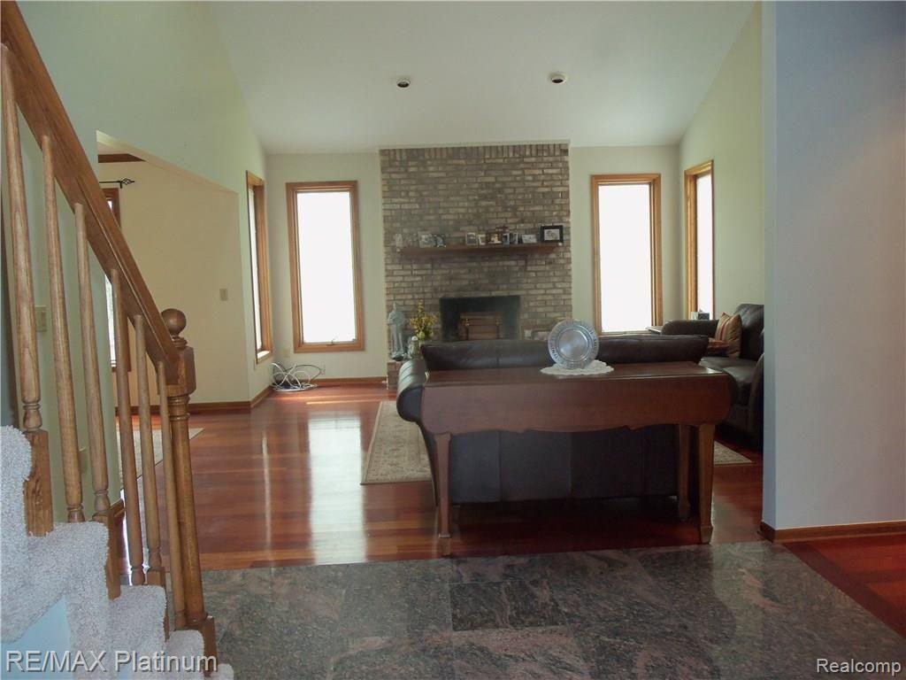 8873 Hyne Road Brighton, MI 48114 - Photo 2 of 19 Foyer to Living Room