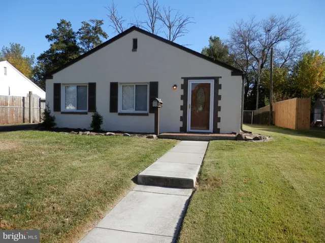 a front view of house with yard