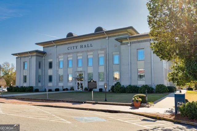 a front view of a building with street view