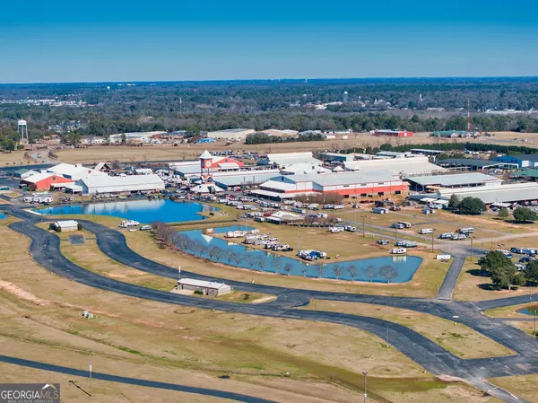 a view of a swimming pool with an ocean view