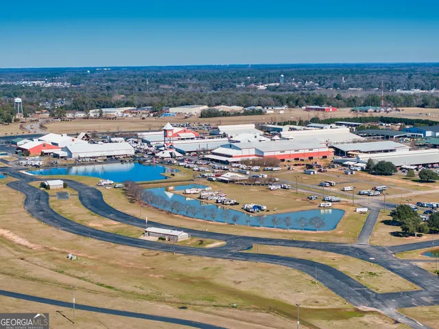 a view of a swimming pool with an ocean view