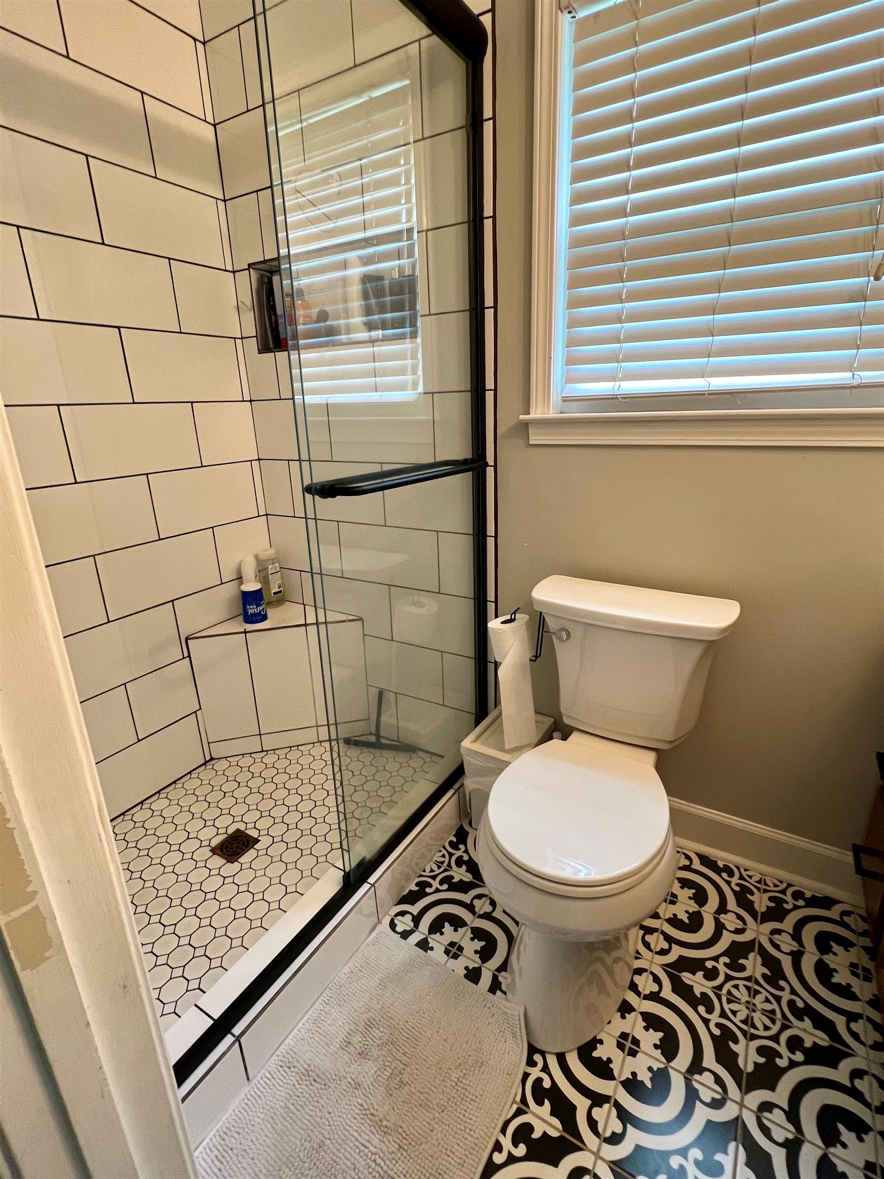 328 Rutledge Street Collierville, TN 38017 - Photo 17 of 19 a bathroom with a toilet and a shower