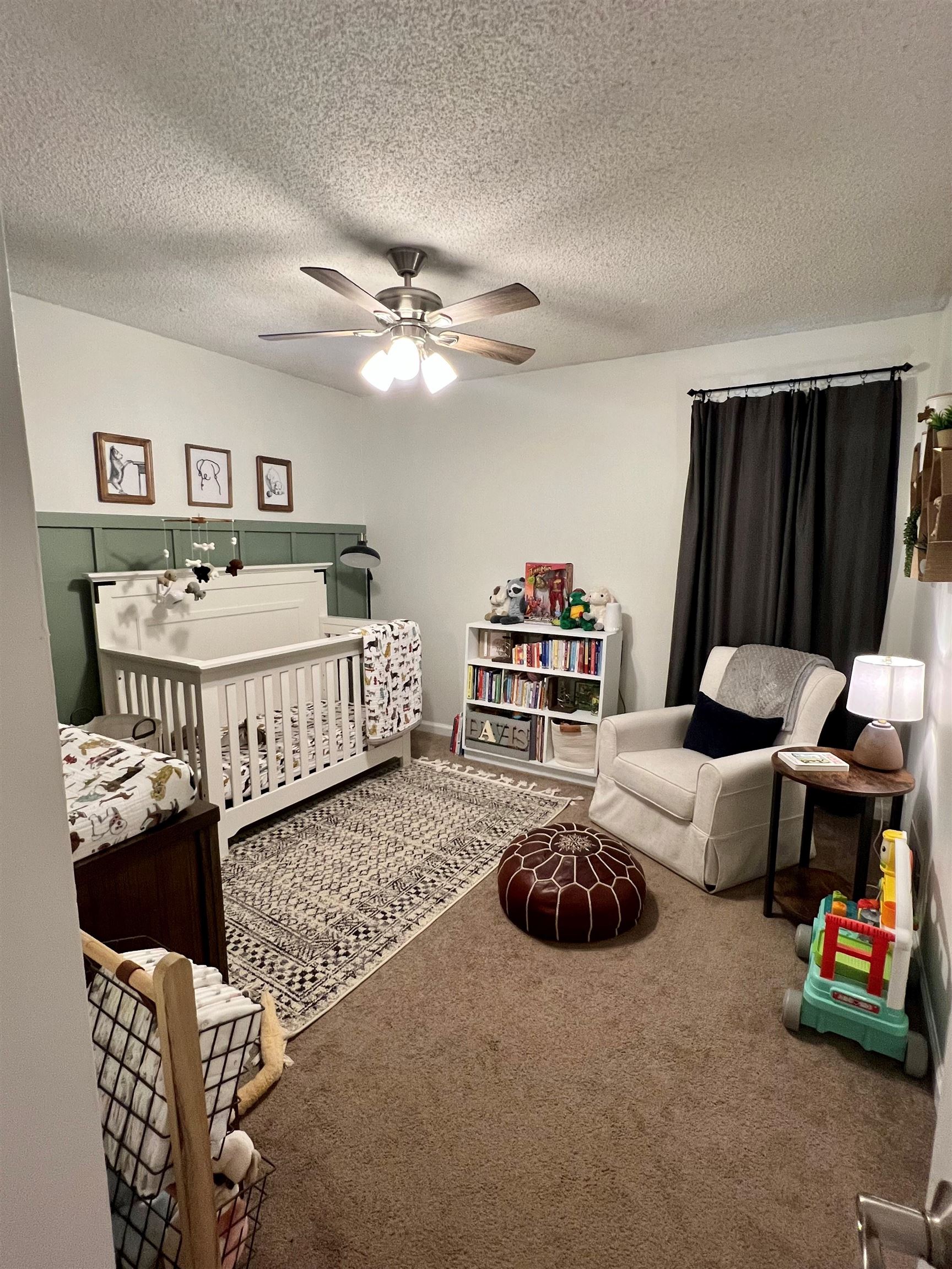 328 Rutledge Street Collierville, TN 38017 - Photo 19 of 19 a living room with furniture ceiling fan and a window