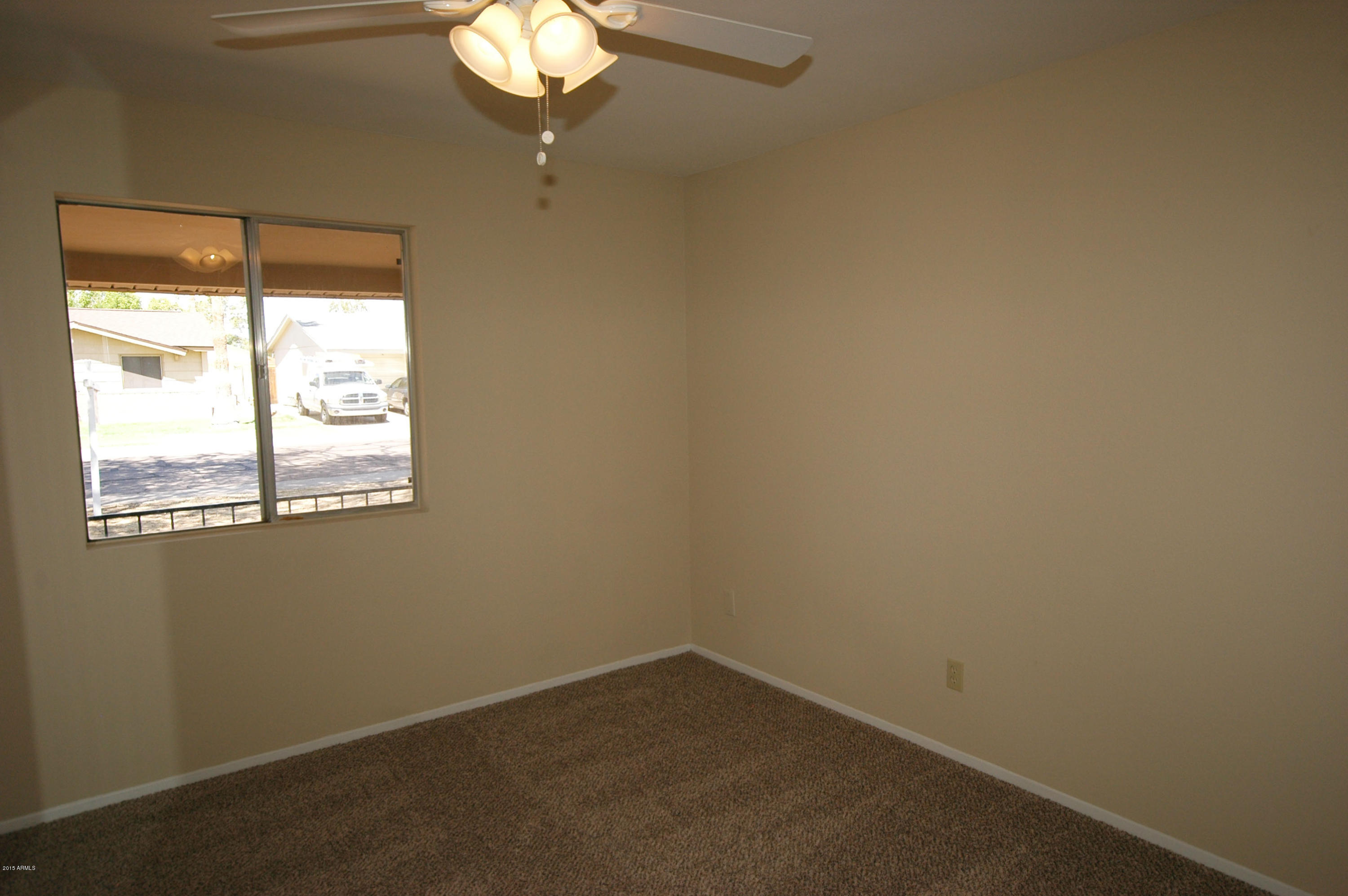 3151 West Redfield Road Phoenix, AZ 85053 - Photo 9 of 15 a small space with a window