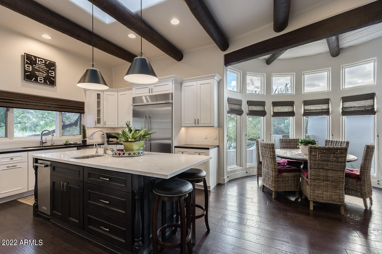 10801 East Happy Valley Road, Unit 74 Scottsdale, AZ 85255 - Photo 17 of 27 a kitchen with sink and view of living room