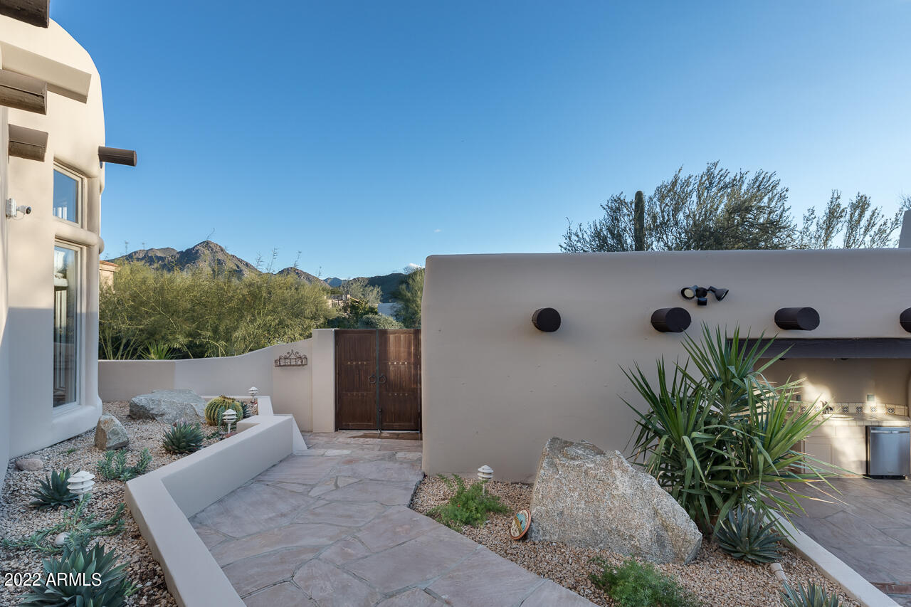 10801 East Happy Valley Road, Unit 74 Scottsdale, AZ 85255 - Photo 2 of 27 a view of a outdoor space with plants