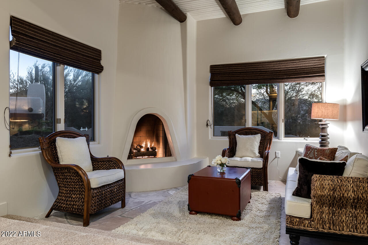 10801 East Happy Valley Road, Unit 74 Scottsdale, AZ 85255 - Photo 26 of 27 a living room with furniture and a window