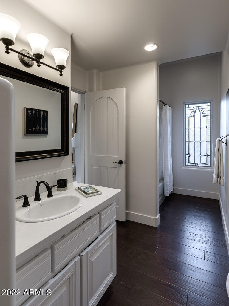 10801 East Happy Valley Road, Unit 74 Scottsdale, AZ 85255 - Photo 7 of 27 a bathroom with double sink and mirror