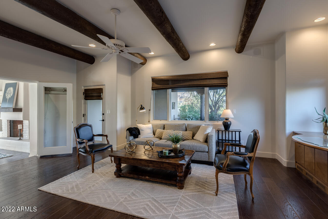 10801 East Happy Valley Road, Unit 74 Scottsdale, AZ 85255 - Photo 8 of 27 a living room with furniture rug and window