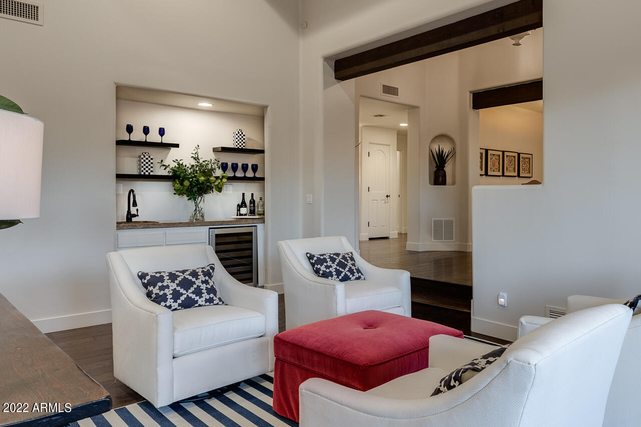 10801 East Happy Valley Road, Unit 74 Scottsdale, AZ 85255 - Photo 10 of 27 a kitchen with a table and chairs