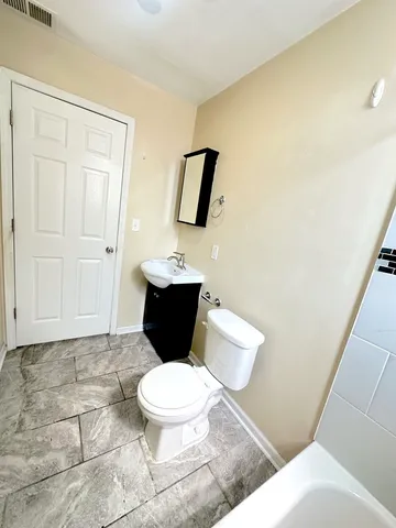 a bathroom with a toilet