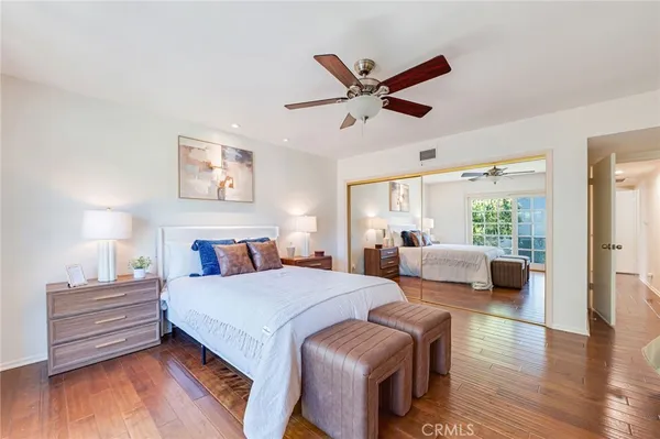 a bed room with bed and window