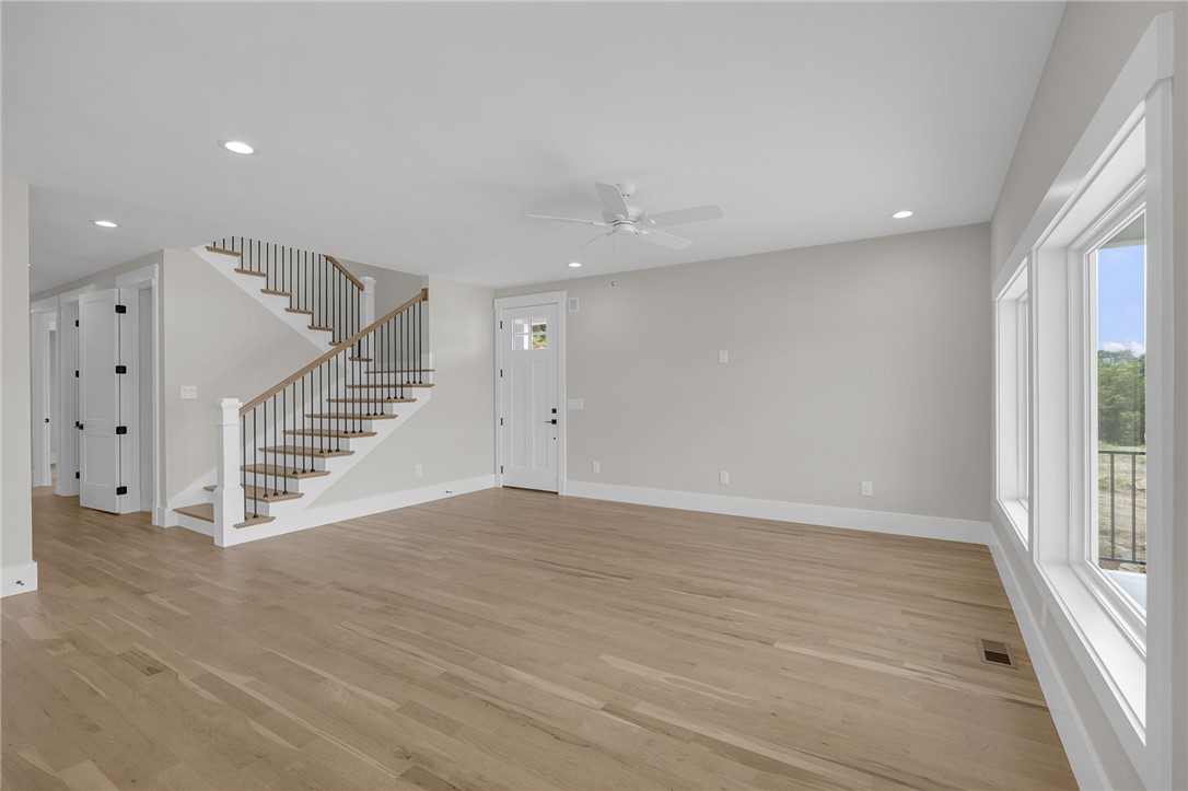 1230 Melton Road, Unit 216 West Union, SC 29696 - Photo 12 of 49 A grand staircase and abundant windows create a welcoming and open living space.