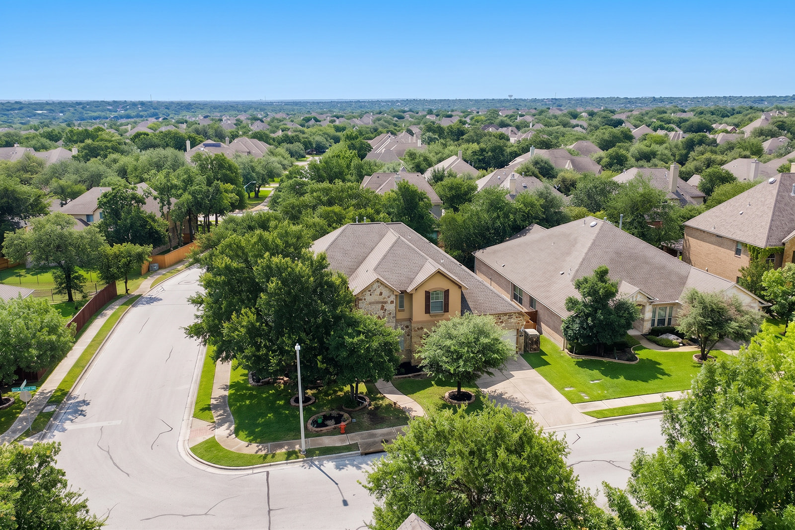 114 North Saddle Ridge Drive Cedar Park, TX 78613 - Photo 4 of 40 an aerial view of a house with garden space and street view