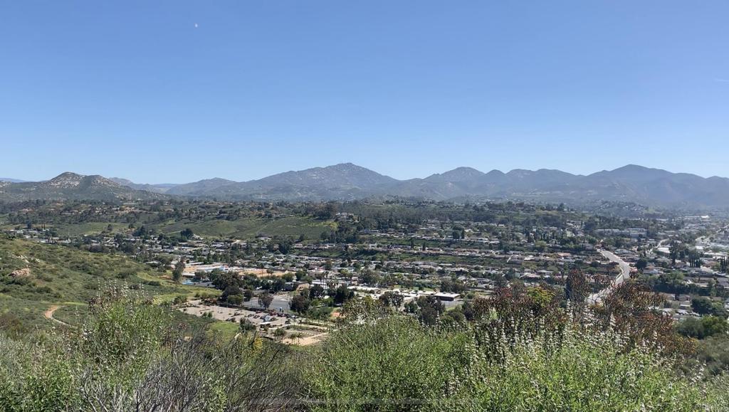0 Dorathea Poway, CA 92064 - Photo 2 of 19 a view of a lush green field with mountains in the background