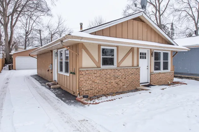 a view of a house with a large window