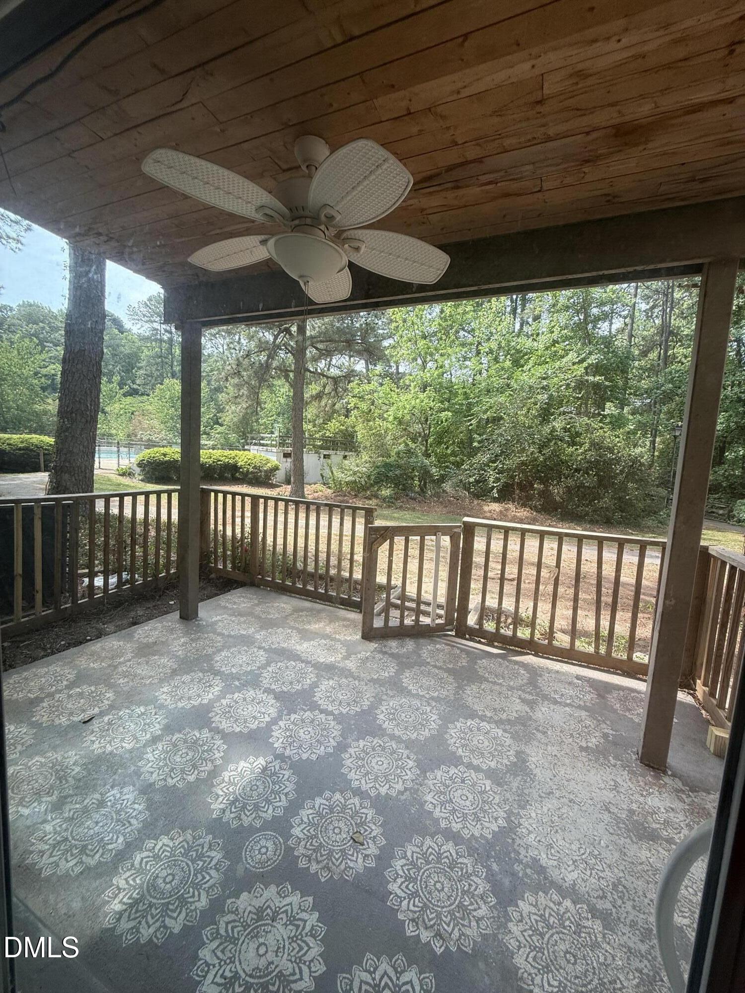 546 Pine Ridge Place Raleigh, NC 27609 - Photo 27 of 28 a view of a porch with wooden floor