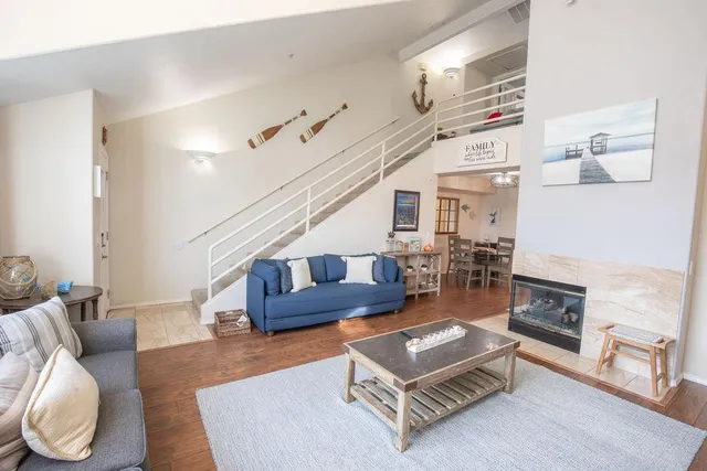 a kitchen with stainless steel appliances granite countertop a refrigerator sink and stove