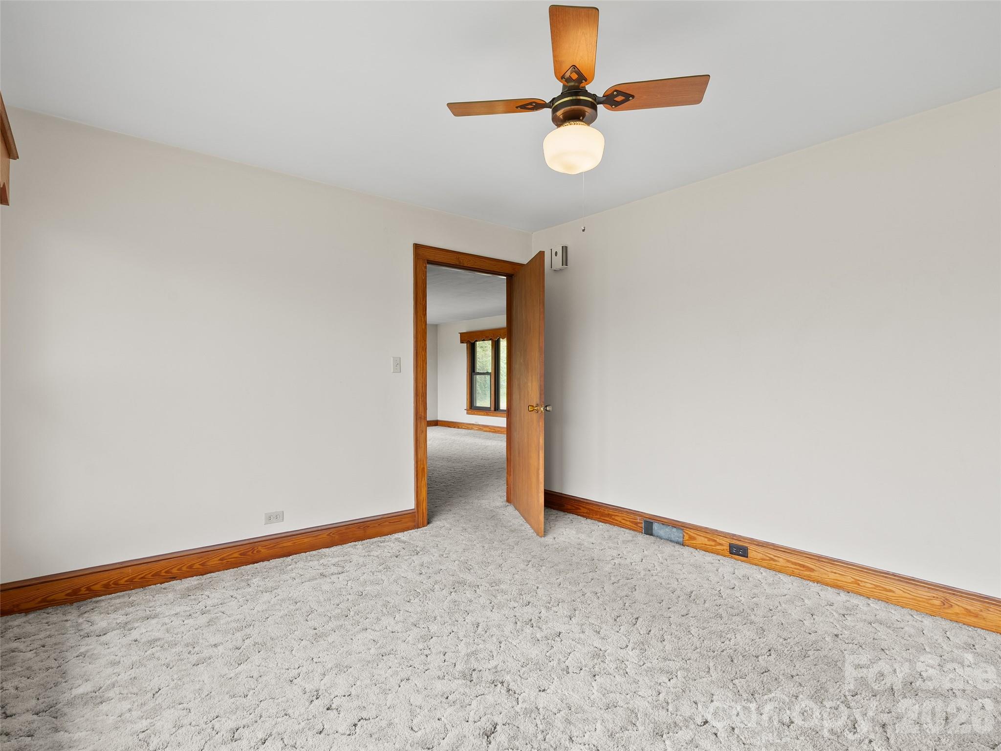 21 Beaverdam Road Canton, NC 28716 - Photo 10 of 24 an empty room with fan