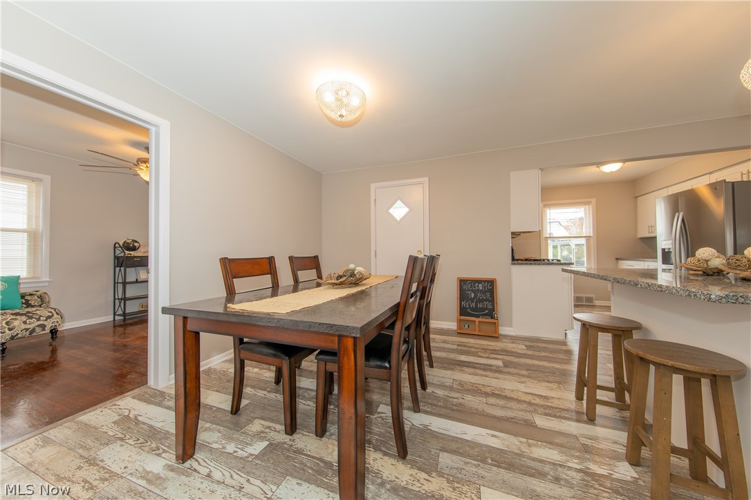 4238 Stonehaven Road Cleveland, OH 44121 - Photo 8 of 25 The Dining Room with its modern open plan design towards the Kitchen