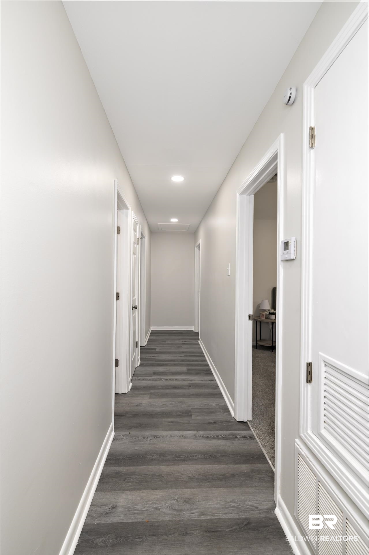5922 Sunnyside Drive Mobile, AL 36619 - Photo 26 of 51 Hallway with baseboards, dark wood-style flooring, and recessed lighting