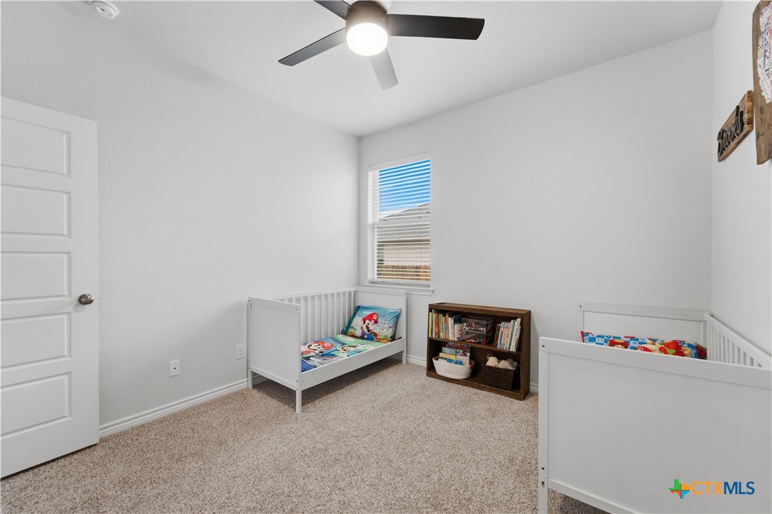 6003 Tivoli Road Temple, TX 76502 - Photo 18 of 30 a children room with toys and a ceiling fan