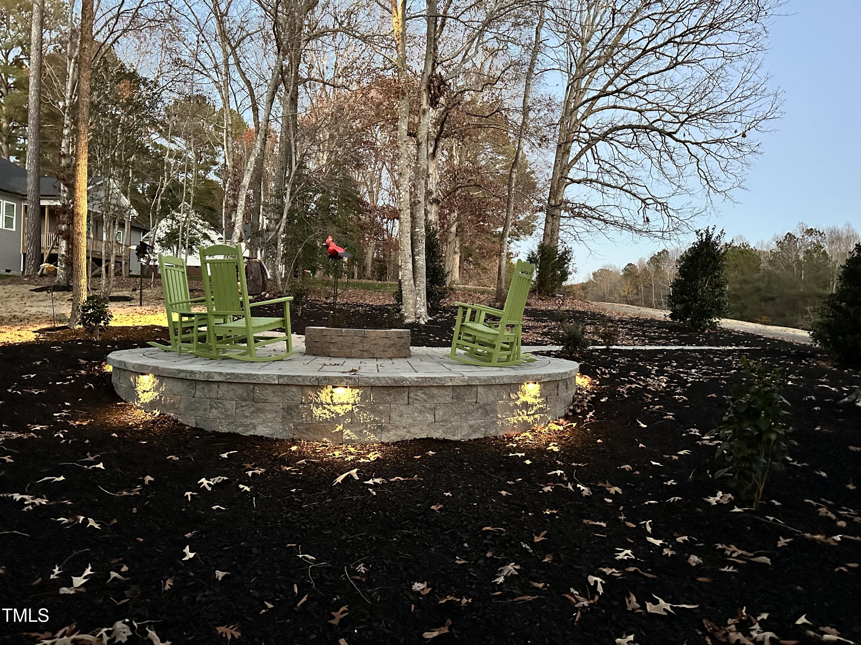 271 Sacred Fire Road Louisburg, NC 27549 - Photo 43 of 48 Fire pit at night jpg