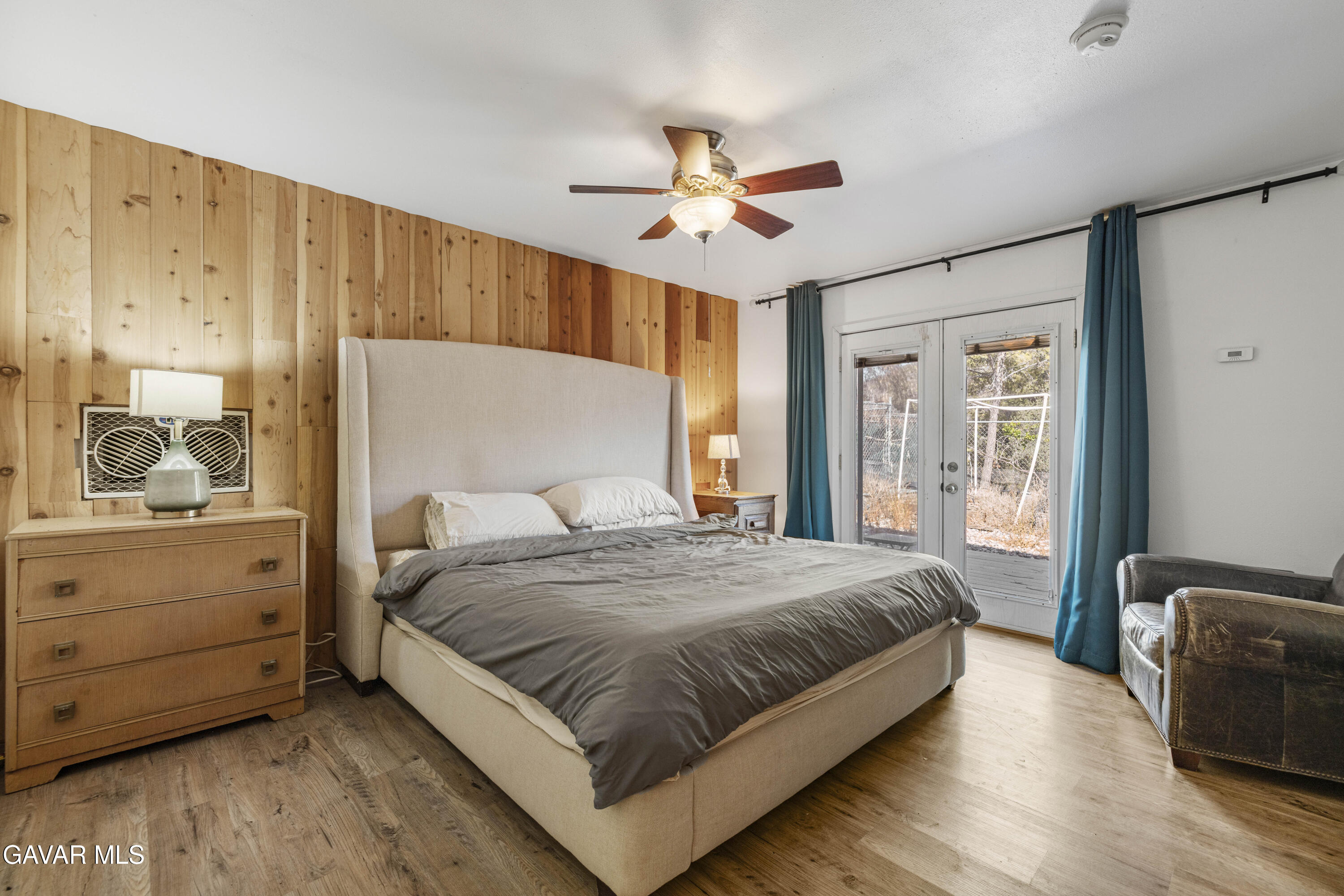 32901 Hawley Road Acton, CA 93510 - Photo 11 of 44 a bedroom with a large bed and a window