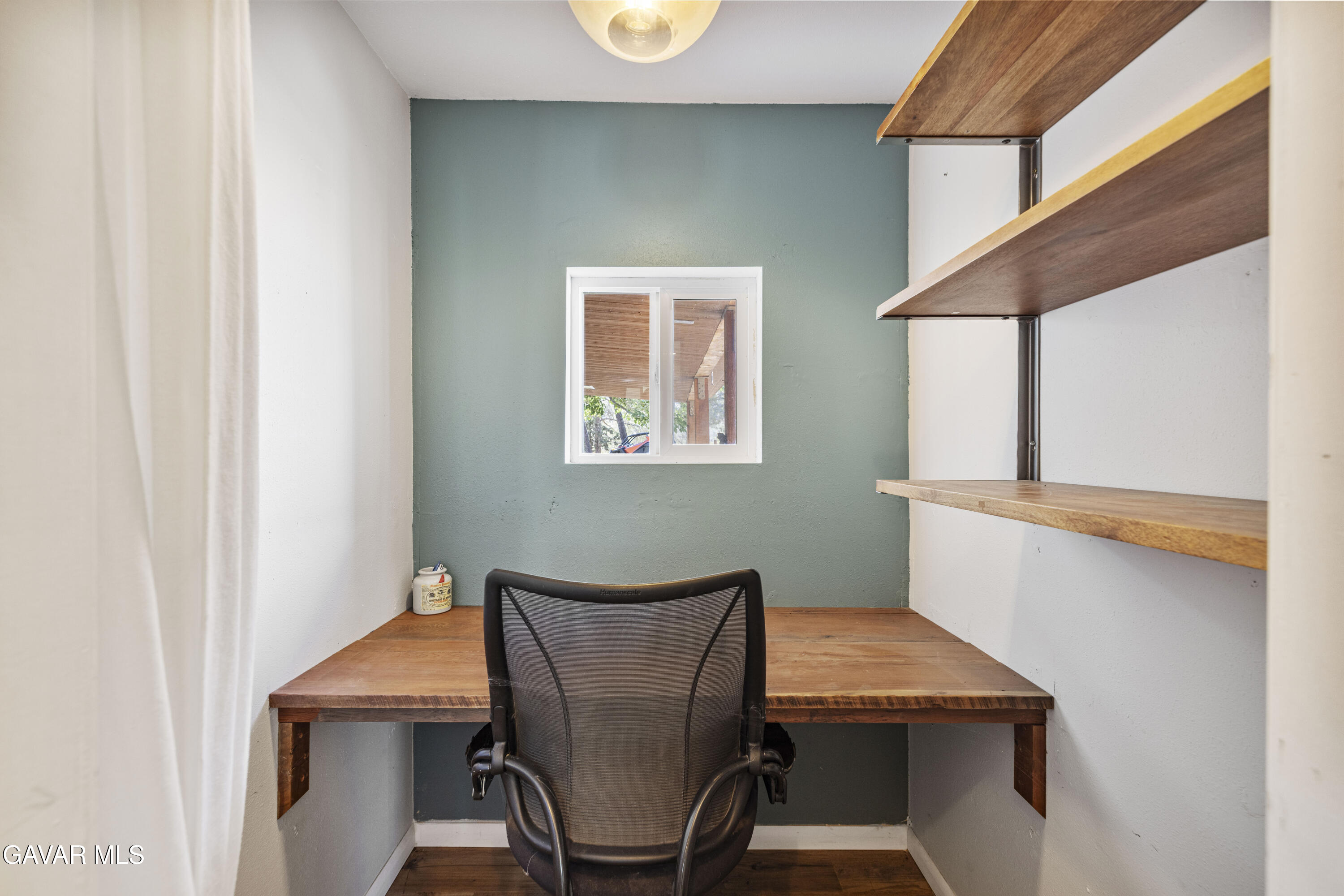 32901 Hawley Road Acton, CA 93510 - Photo 16 of 44 a view of a dining room with furniture