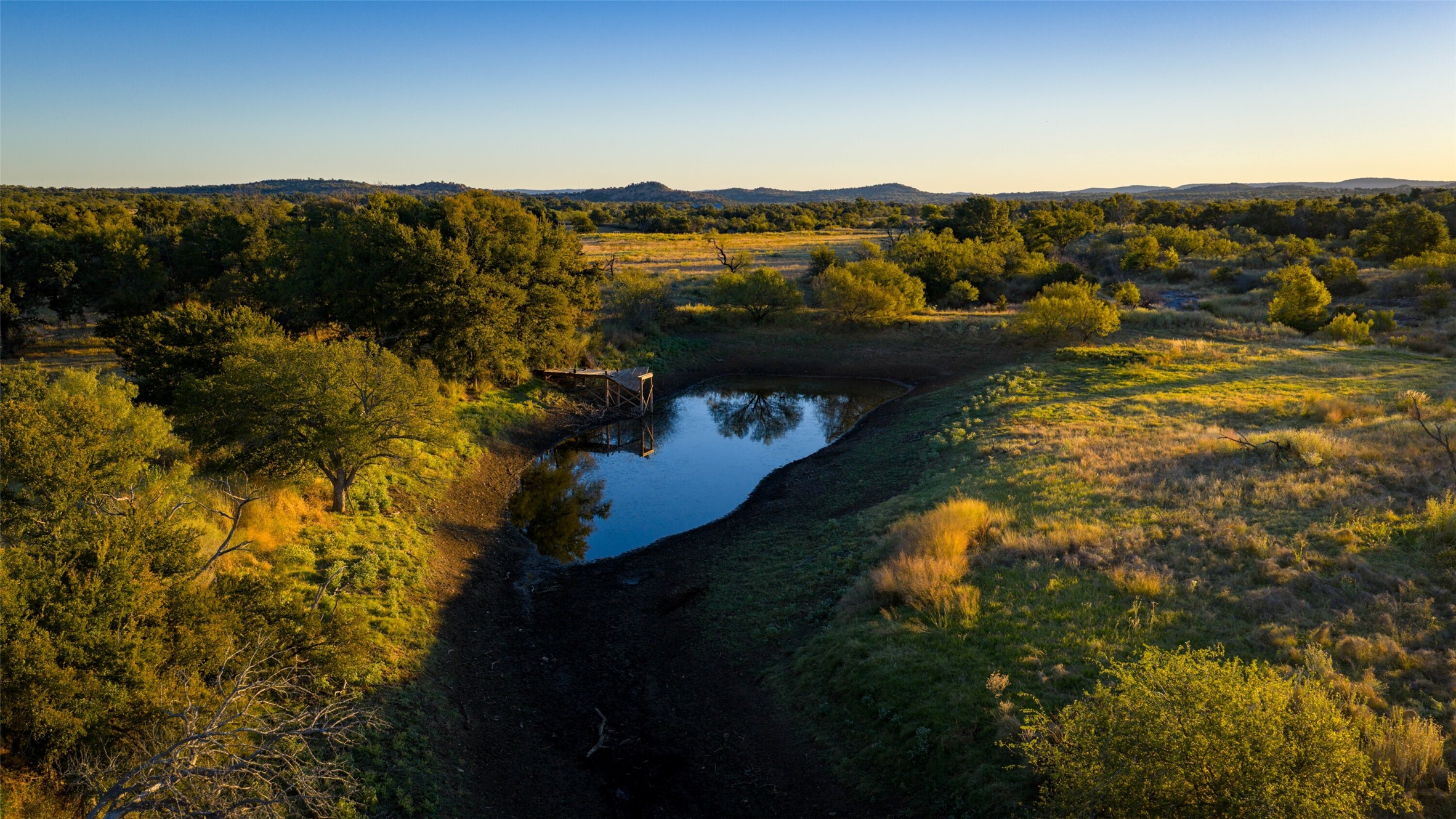 7702 Ranch Road 965 Llano, TX 78643 - Photo 40 of 40 a view of a lake in middle of the town