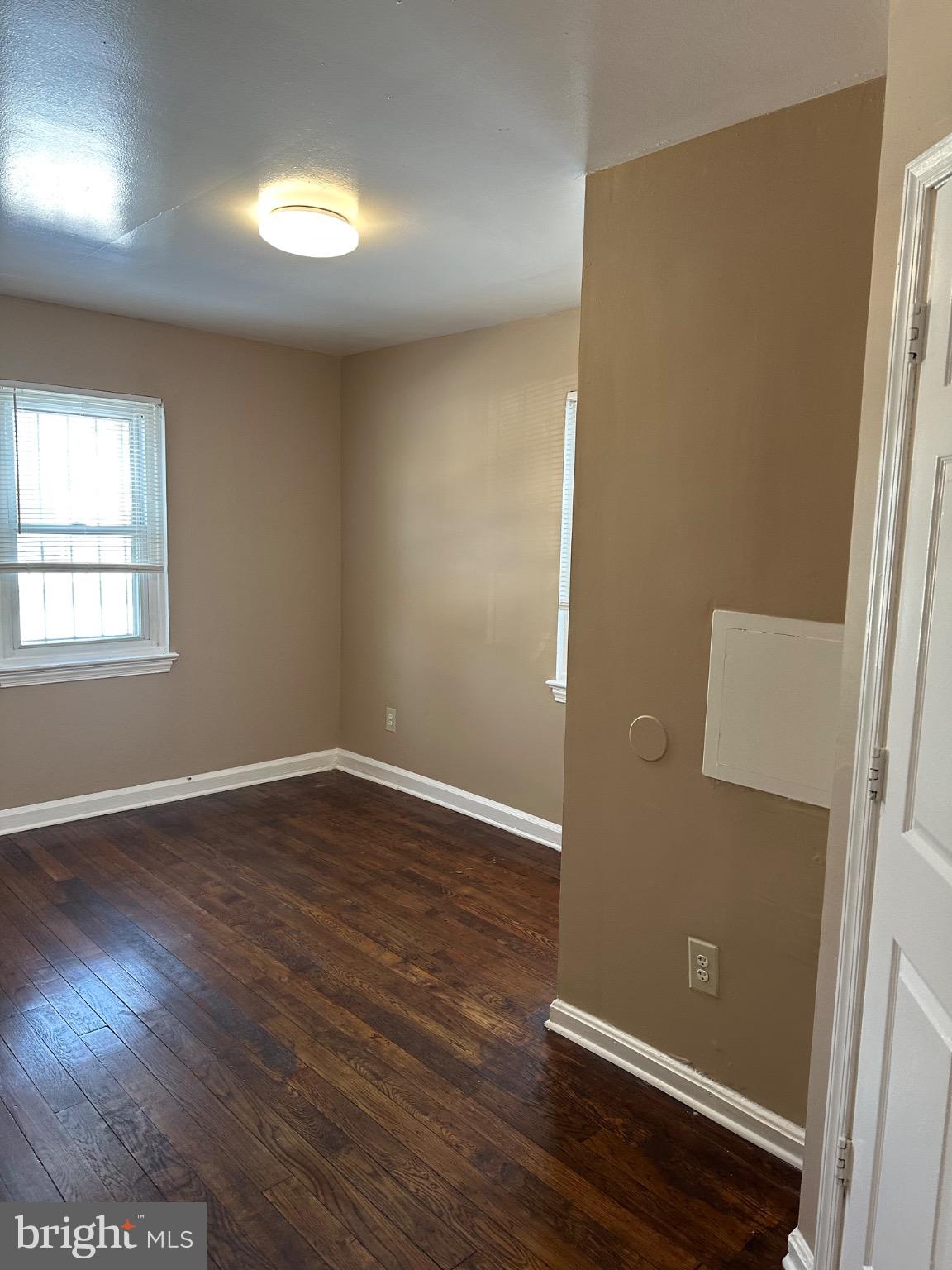 1449 Olive Street Northeast, Unit 4 Washington, DC 20019 - Photo 11 of 19 Bright and inviting room with warm tones.