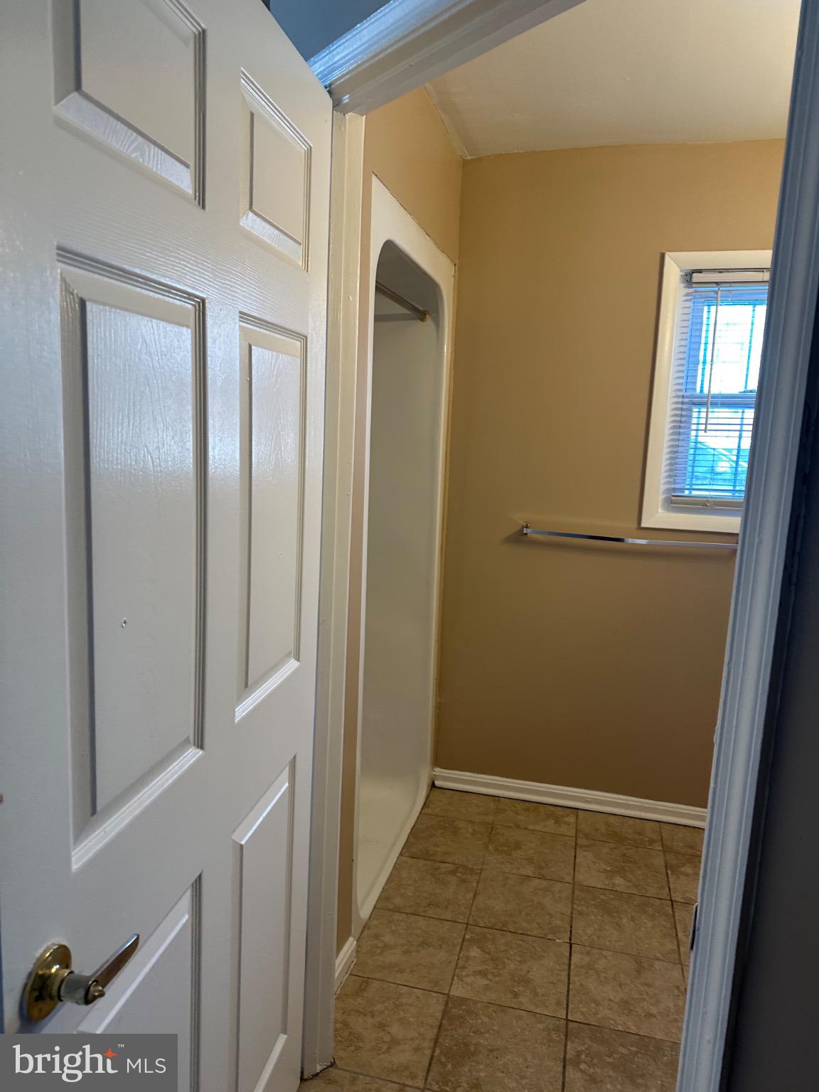 1449 Olive Street Northeast, Unit 4 Washington, DC 20019 - Photo 14 of 19 Bright and inviting bathroom entryway.