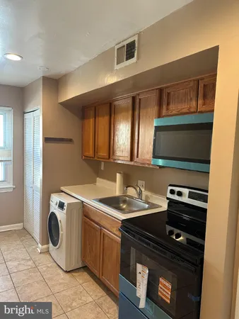 $1,350 | 1449 Olive Street Northeast, Unit 4, Washington, DC 20019