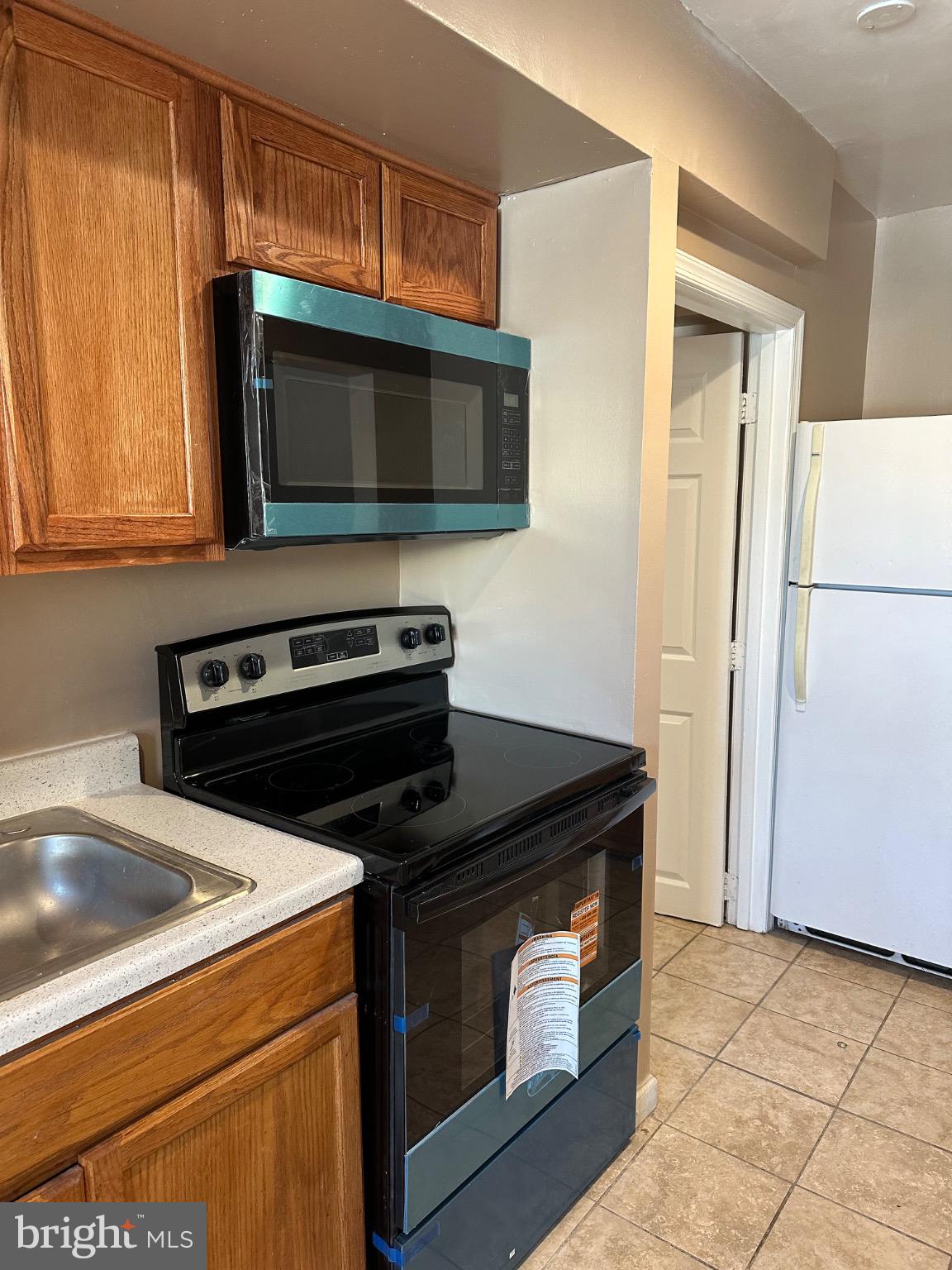 1449 Olive Street Northeast, Unit 4 Washington, DC 20019 - Photo 5 of 19 Modern kitchen with sleek appliances.