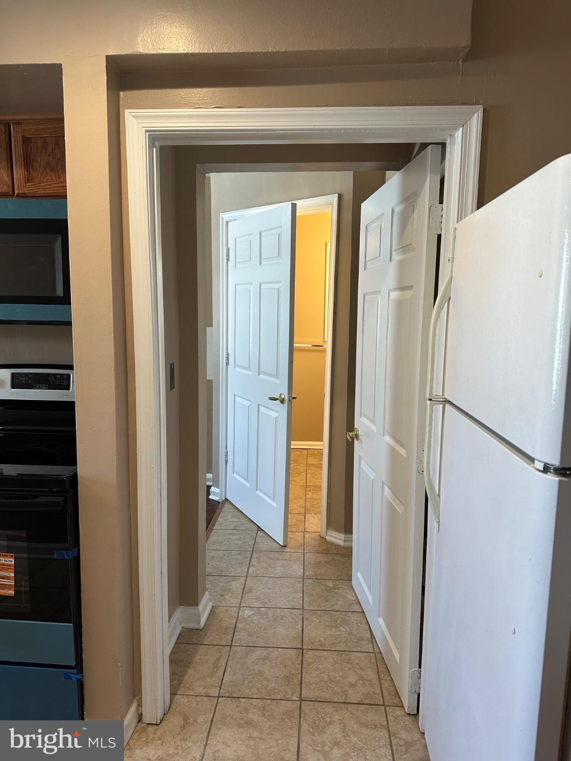 1449 Olive Street Northeast, Unit 4 Washington, DC 20019 - Photo 7 of 19 Inviting entryway to a cozy home.