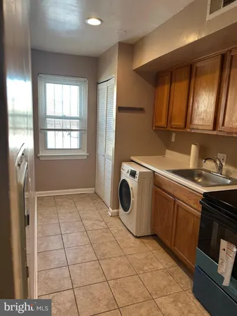 $1,350 | 1449 Olive Street Northeast, Unit 4, Washington, DC 20019