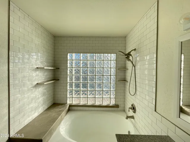 a view of a bathroom with a shower