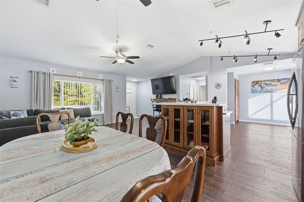 10448 Utah Street Spring Hill, FL 34608 - Photo 28 of 54 a view of a dining room with furniture window and wooden floor