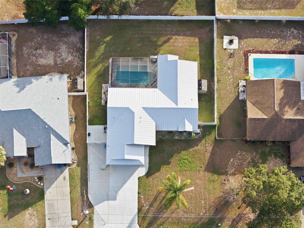 10448 Utah Street Spring Hill, FL 34608 - Photo 8 of 54 an aerial view of a house with swimming pool