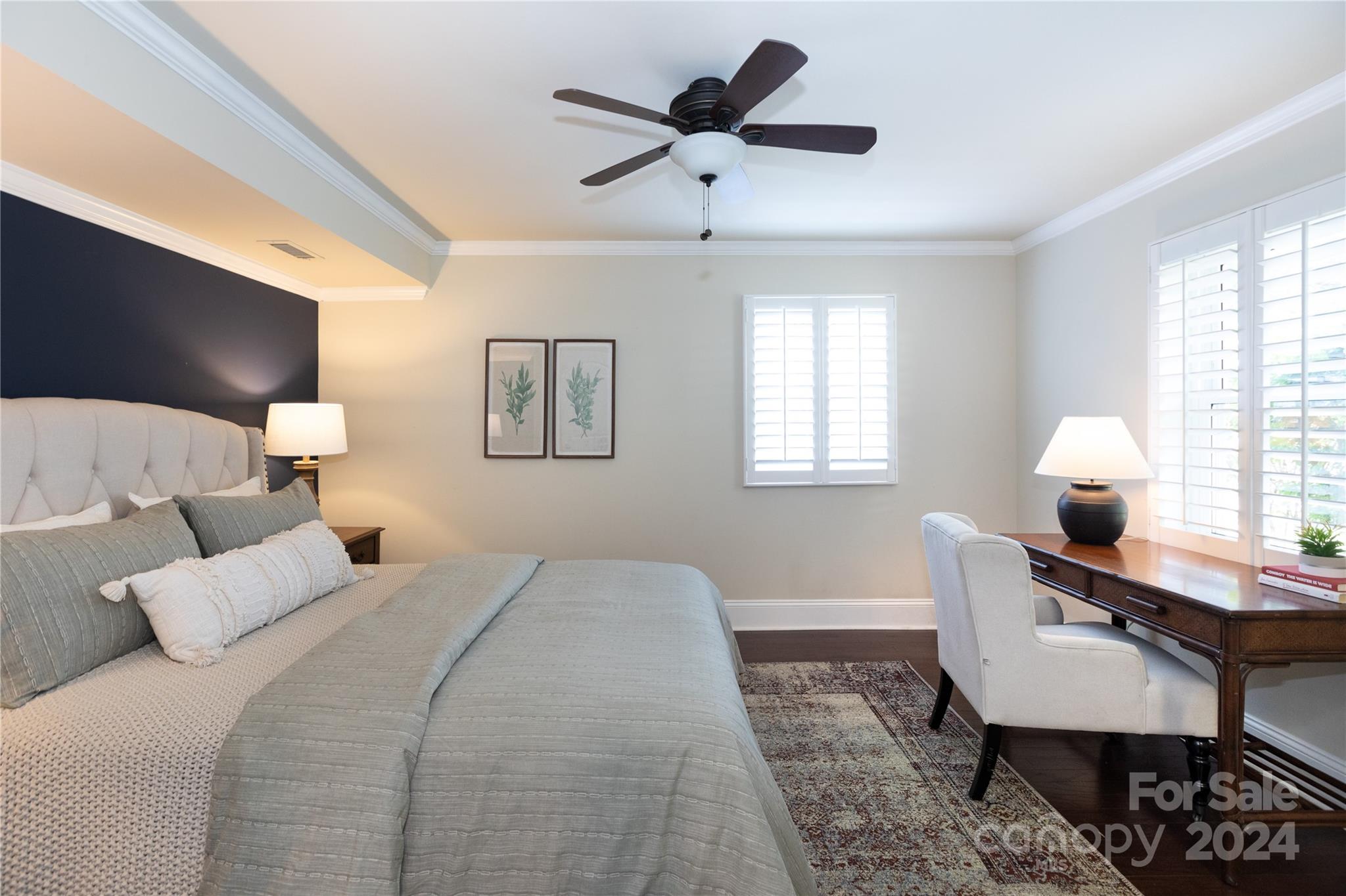 3828 Farmview Road Charlotte, NC 28205 - Photo 14 of 44 a bed room with bed and window