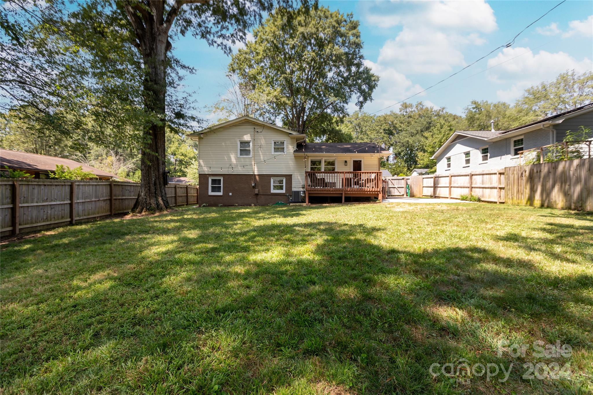 3828 Farmview Road Charlotte, NC 28205 - Photo 3 of 44 a view of a house with a yard and sitting area