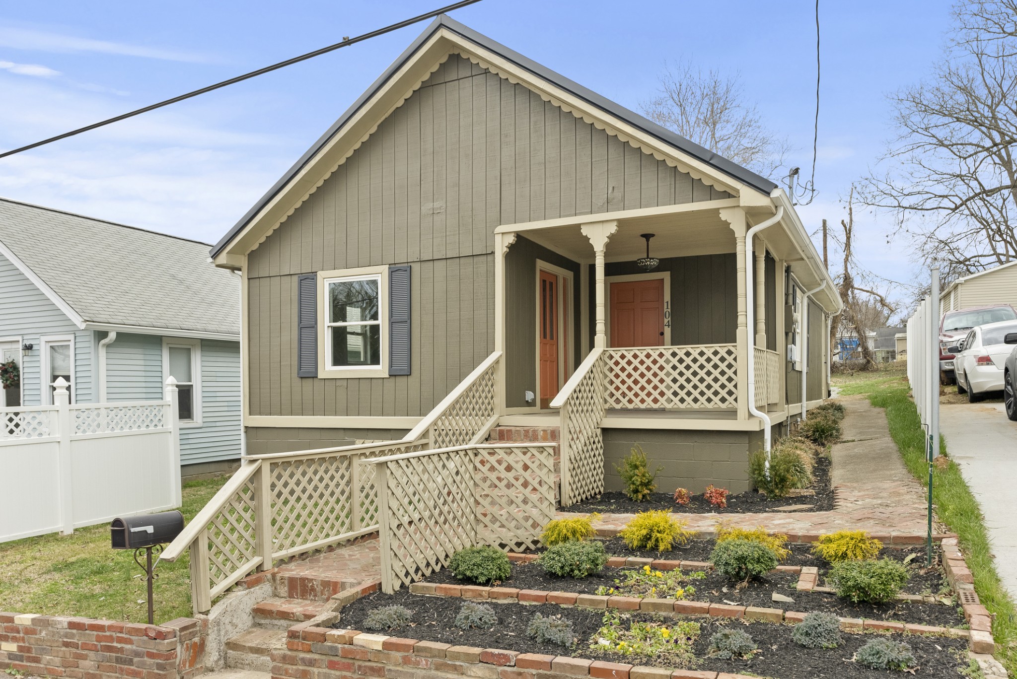 a front view of a house with garden